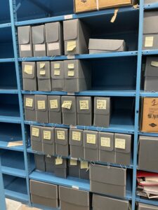 Archival boxes on shelves