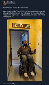 Man in wheelchair by door