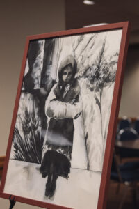 black and white poster: young girl in poverty