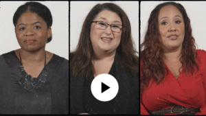 Three women posing in a video with a play button