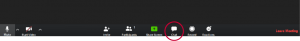 The Zoom toolbar at the bottom of the Zoom window. The Chat icon at the bottom is highlighted.