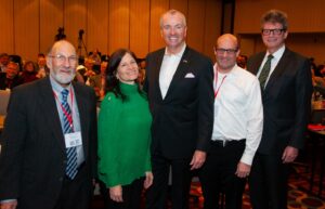 New Jersey Governor Phil Murphy (center) with Rutgers Executive Dean Peter March (right) and the three most recent Directors of DIMACS -- Fred Roberts, Rebecca Wright, and David Pennock – at the DIMACS 30th Birthday Conference.