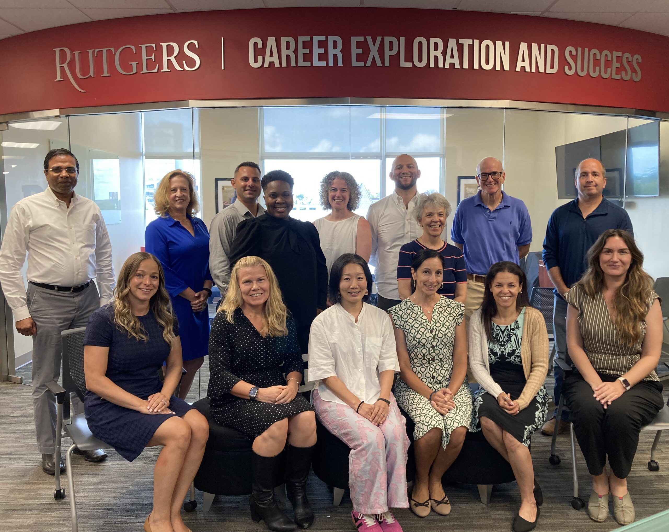Faculty fellows sitting and posing for a photo.