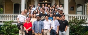 Rutgers Linguistics department members standing on front porch