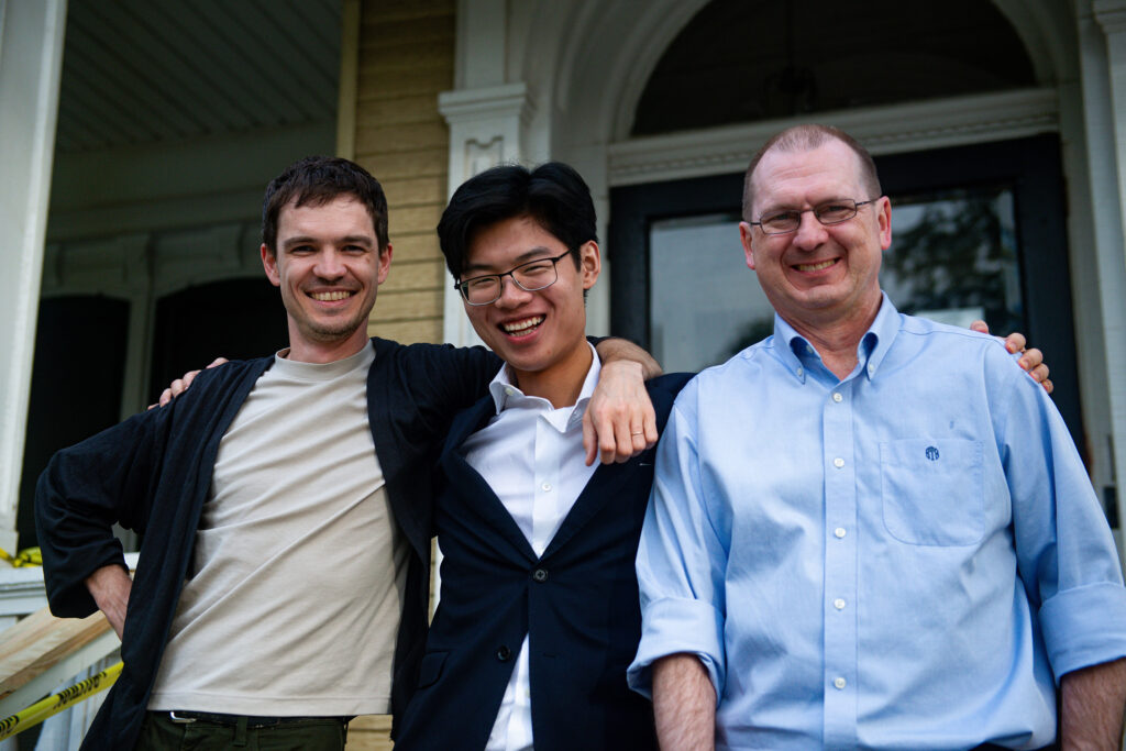 Huteng Dai (center) with dissertation committee members Prof. Adam Jardine (right) and Prof. Bruce Tesar (left)