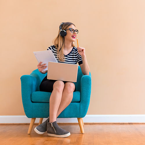 Woman sitting with computer