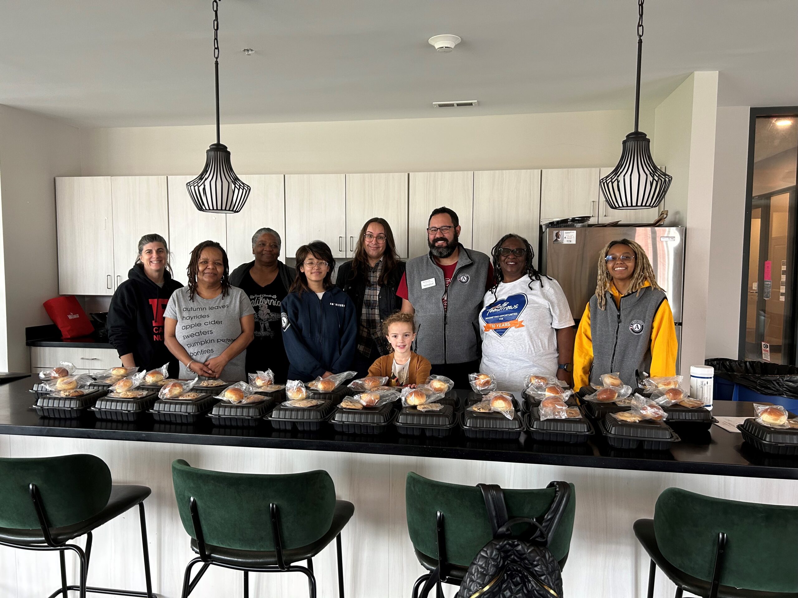 AmeriCorps members and our partners at the Branches serve meals to 60 residents for Thanksgiving