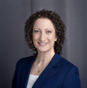 Headshot of Mary Malyska in a navy blazer.